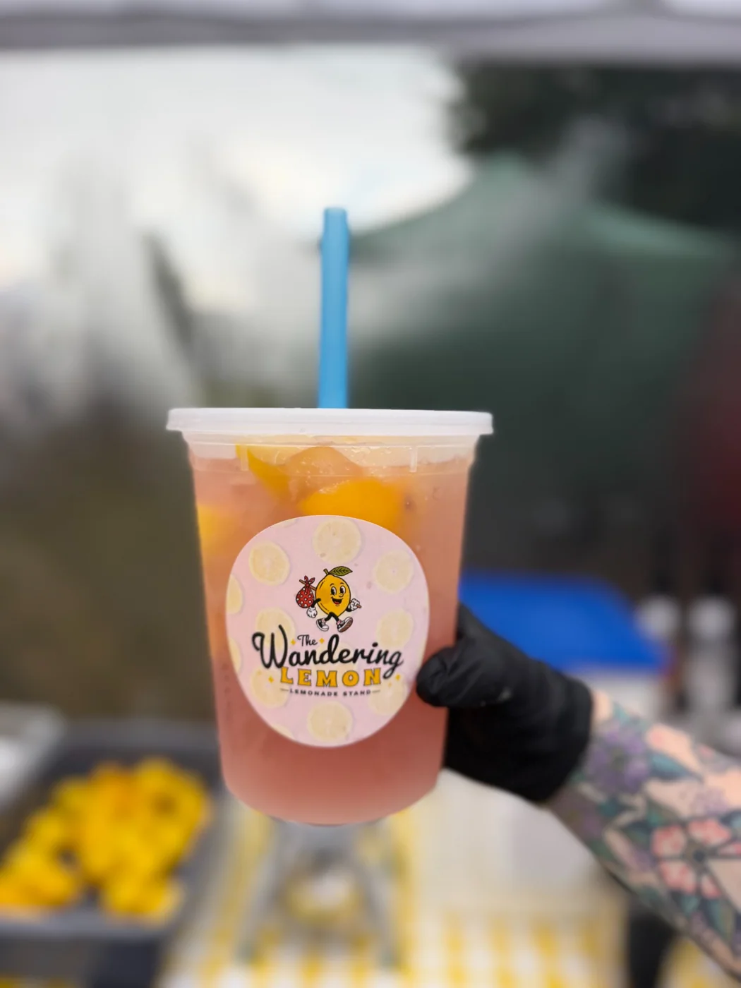 Fresh pink lemonade with The Wandering Lemon logo